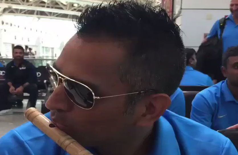 Ms dhoni with flute