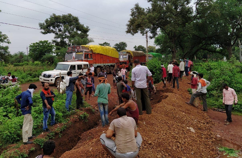 Long queues of trucks after the Nivaran railway station approach road was dug up from JCB.