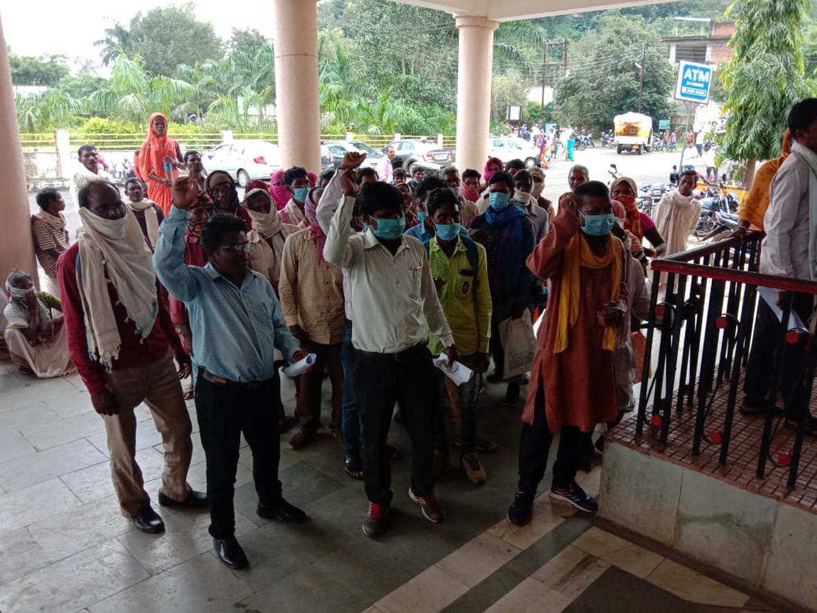 Villagers reaching collectorate to make food slips