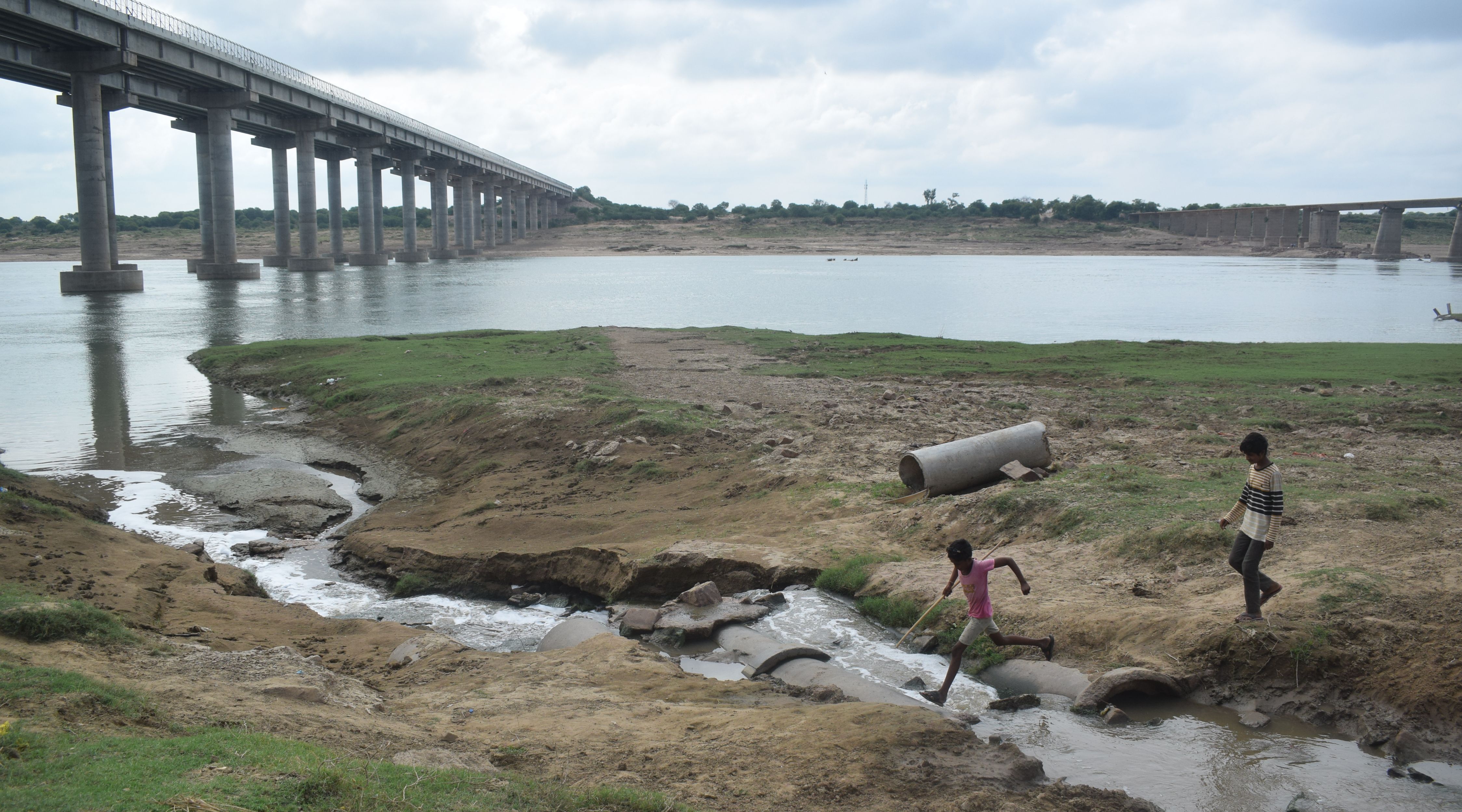 Clean Chambal river getting dirty from the dirty water of the city, dirty drains of the city falling in the river