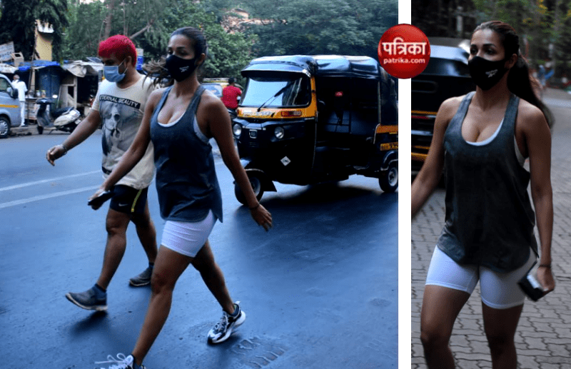 मुंह पर मास्क, वाइट बाइकर्स शॉर्ट्स में वॉक पर निकलीं Malaika Arora , देखें फोटोज