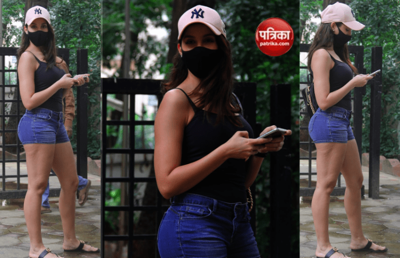 ब्लैक टैंक टॉप, डेनिम शॉर्टस में Nora Fatehi ने ढाया कहर, देखें फोटोज
