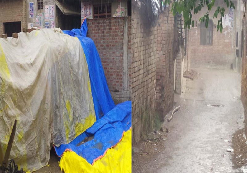 बरसात में पालीथिन से ढ़ककर गेंहू बचाने की कोशिश