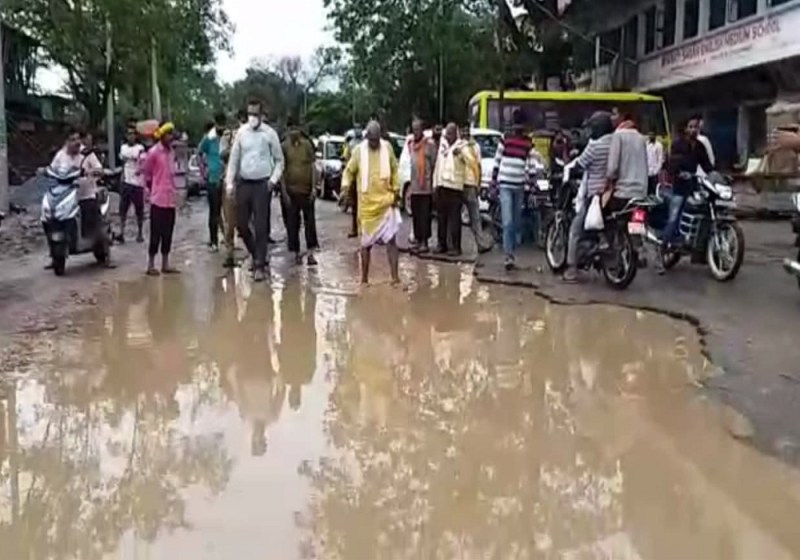 BJP MLA Surendra Singh makes officer walk on mud water