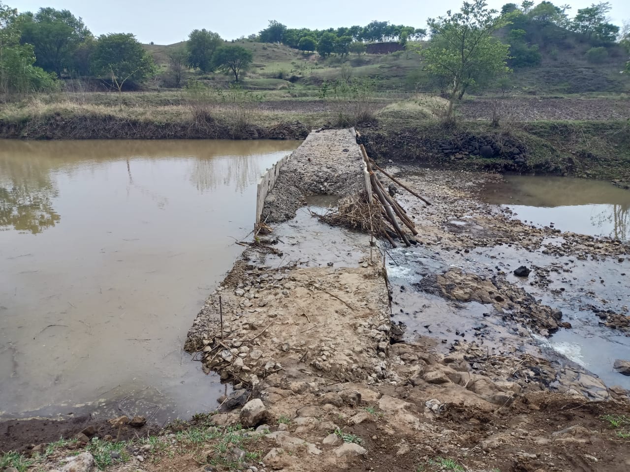 Front part of check dam washed away, continuous water leakage