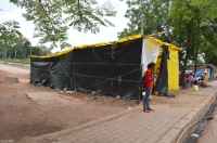 Slum breaker in the way of railway