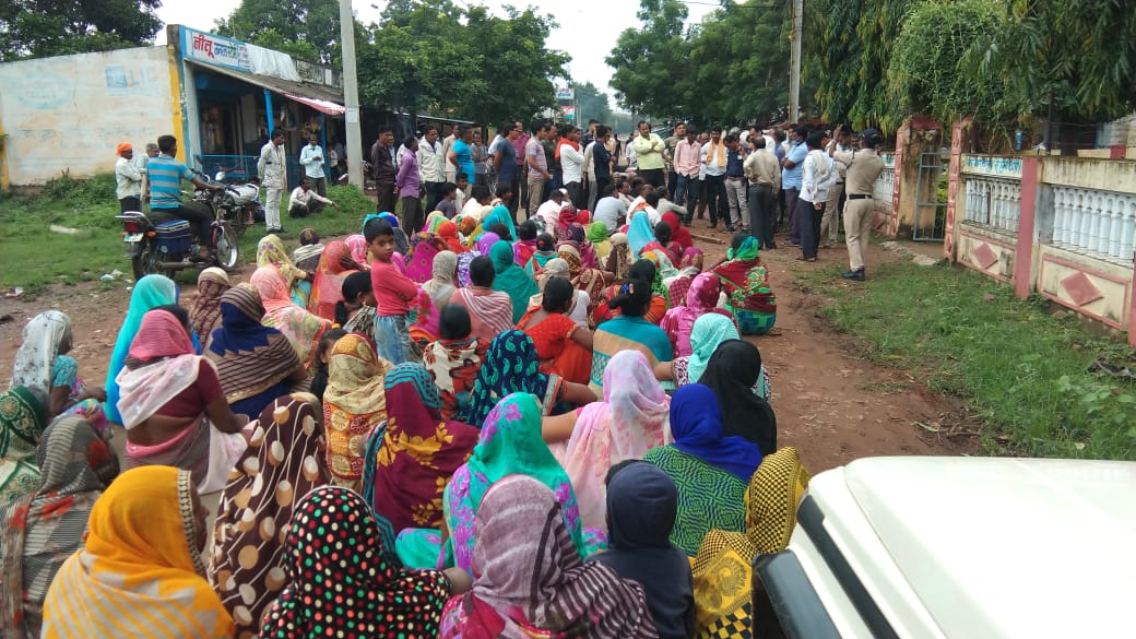 Villagers sitting on dharna in front of Panchayat