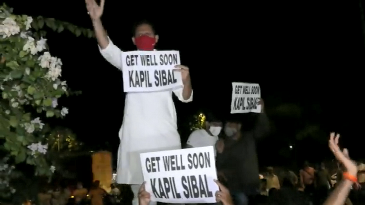 Kapil Sibal comment reaction, Delhi Congress workers smashed his car and protest outside house 