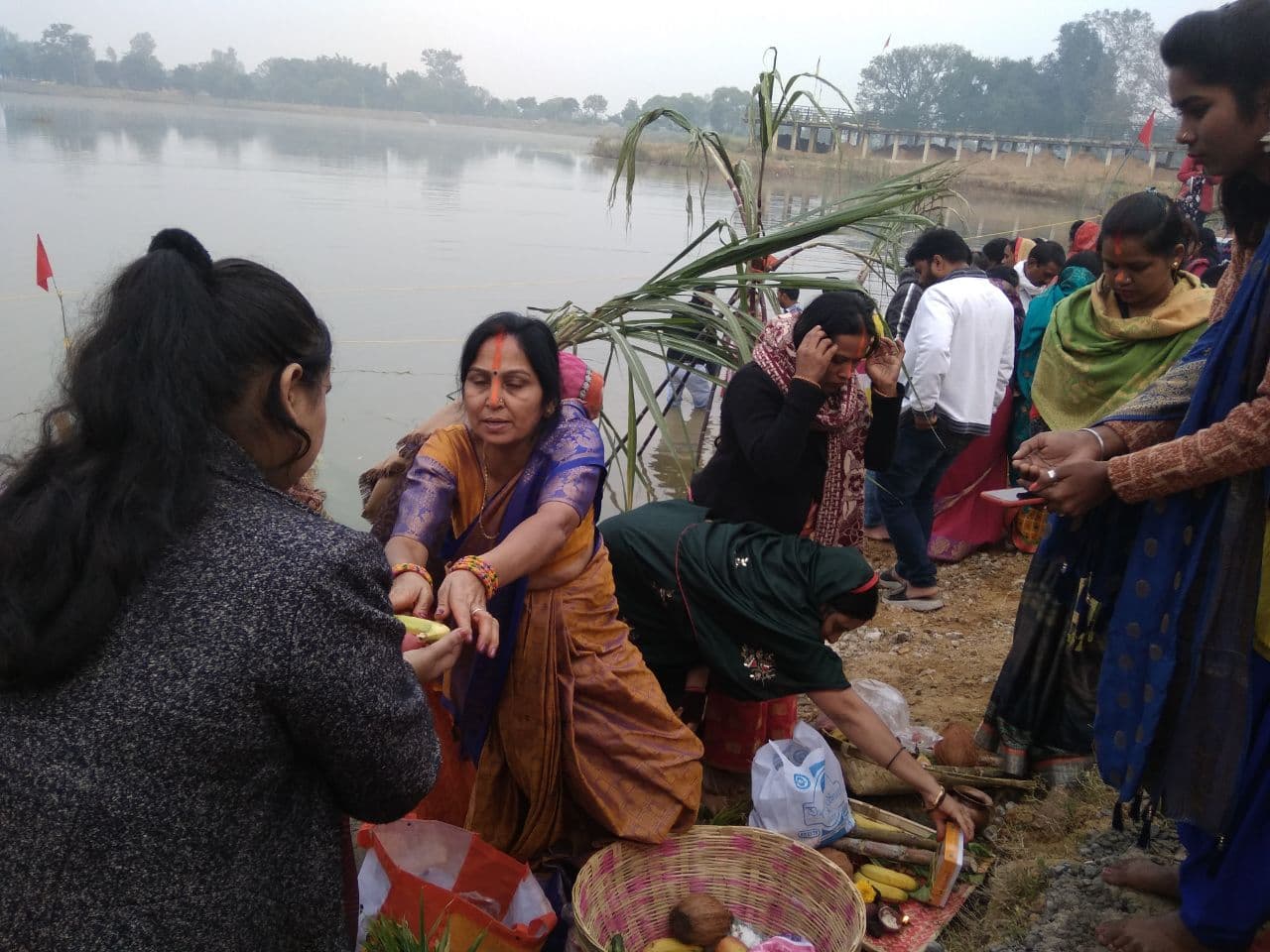 The devotees broke the fast with Paran, since morning the river-pond g