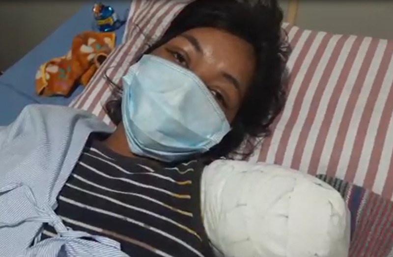 girl Hand cut Out Of The Window in baran