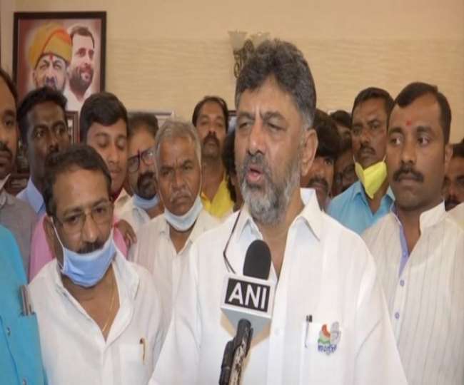 Karnataka Congress President DK Shivakumar scolds a man who tries to take a selfie with him