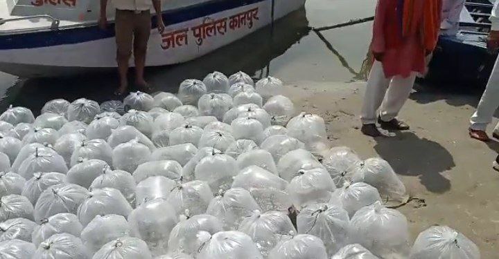 Minister Sanjay Nishad Through dead Fish Into Ganga in Kanpur