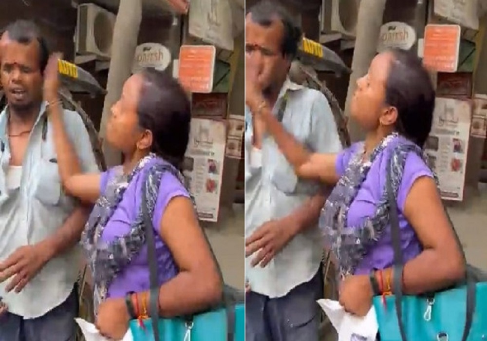 woman_slaps_e-rickshaw_driver_after_colliding_with_car_in_noida.jpg