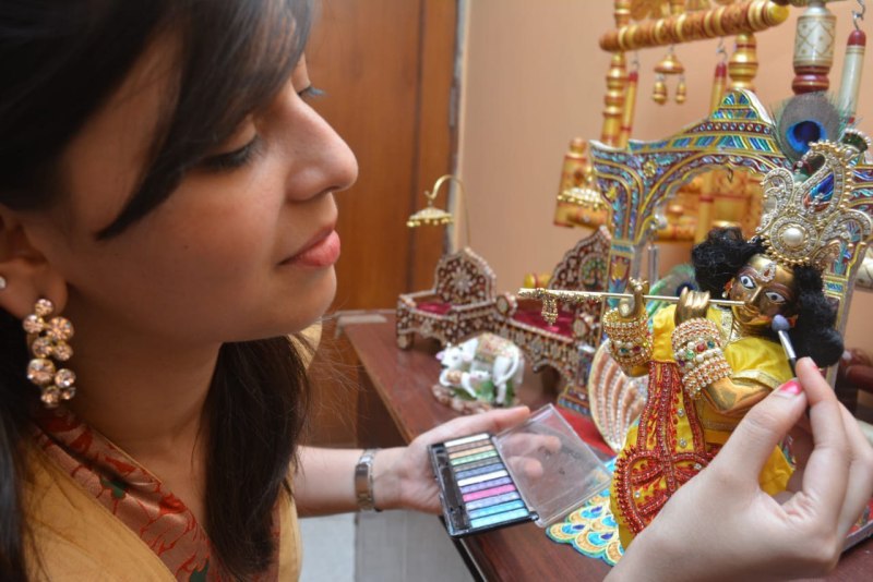 Laddu Gopal sit on the swing after getting Ready from parlor facials along with the manicure