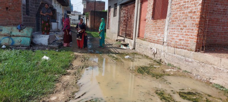 Swampy plains, raw open drains flowing near the population