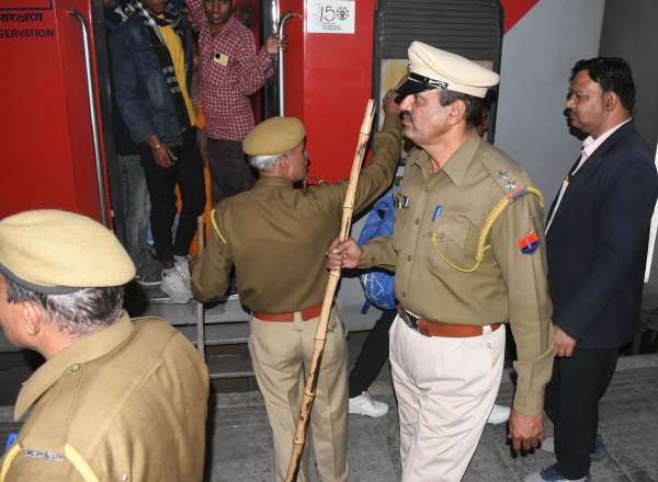 crowd of examinees at the bus stand and railway station