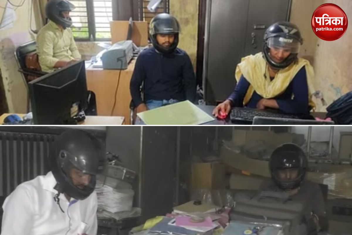 Baghpat electric department clerk wearing helmet in office