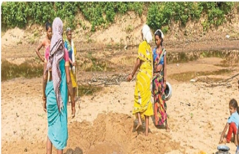 Villagers are extracting drinking water by digging a drain in the drying river, officials are not helping