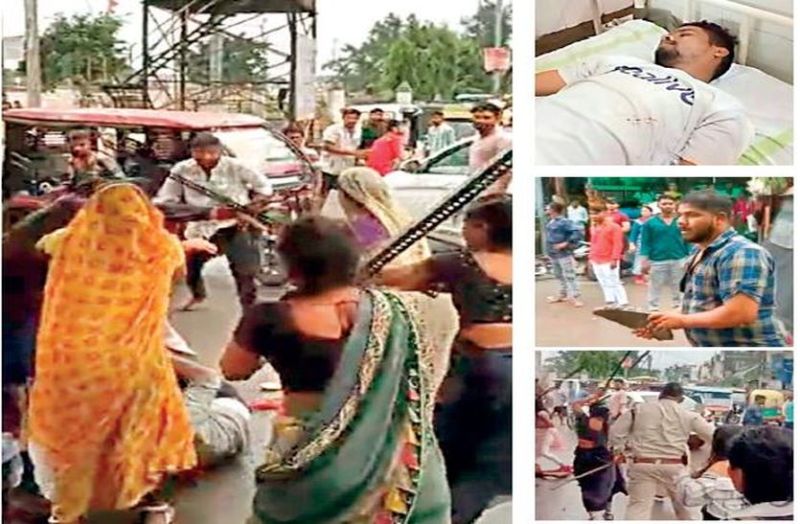 In front of the police, the women beat the young man with pipe-angle