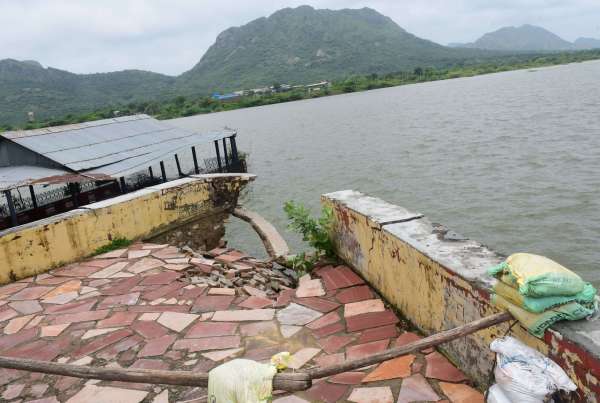 The wall of Foysagar lake was broken. Water filled in the surrounding
