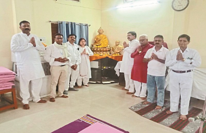 Flowers offered at the statue of Lord Buddha in DD Nagar