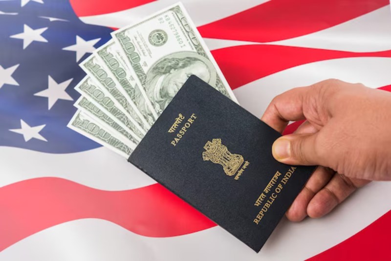 indian_passport_with_american_dollars_and_flag.jpg