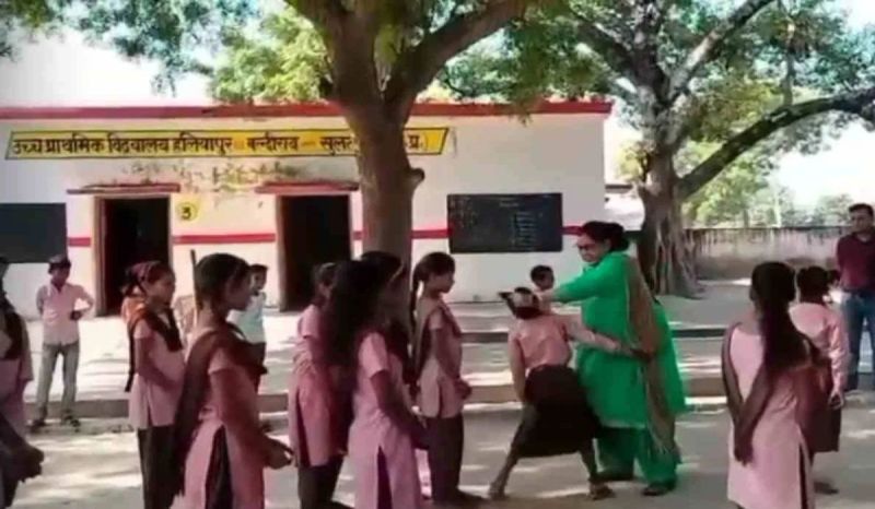 principal beats girl by holding hair video goes viral