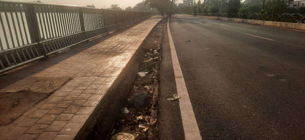 Potholes on pathway, not easy walking