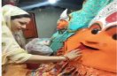 A woman performs the aarti of Maa Gadhkalika