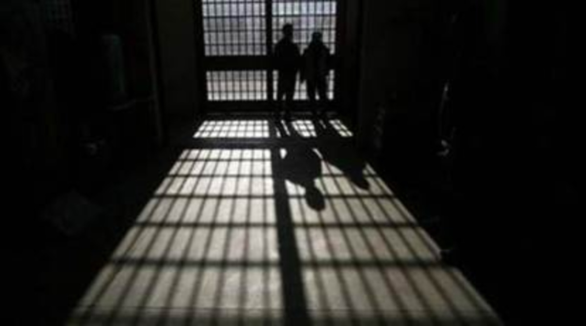 2_people_in_jail_silhouette.jpg
