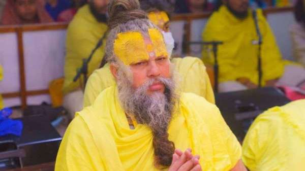 Premanand Maharaj wear yellow dress