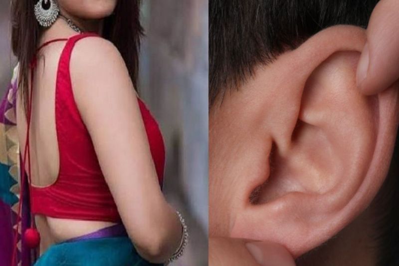 woman cuts young man ear