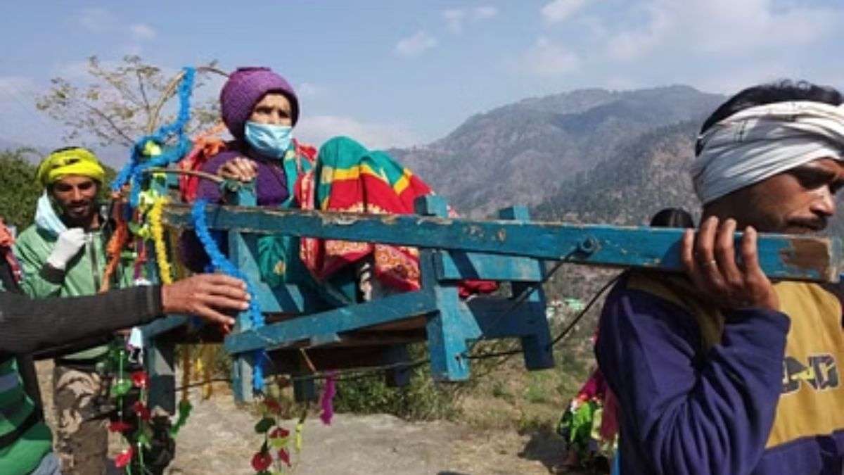 in_roadless_villages_of_uttarakhand_elderly_voters_are_transported_to_the_polling_station_by_handcart_1.jpg