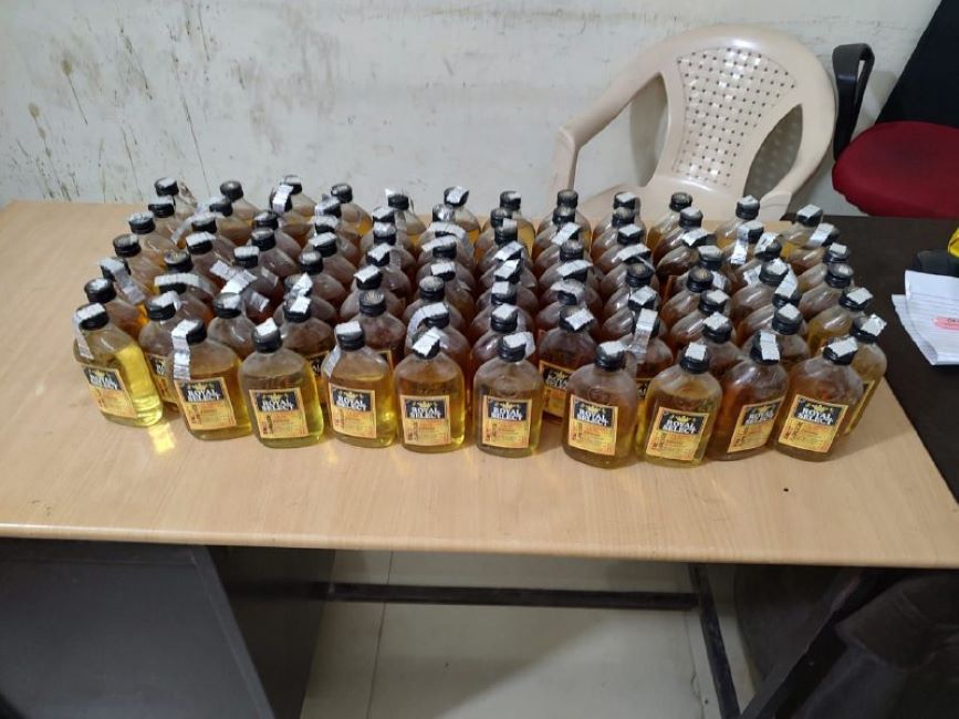 Young man arrested with 95 quarters of English liquor