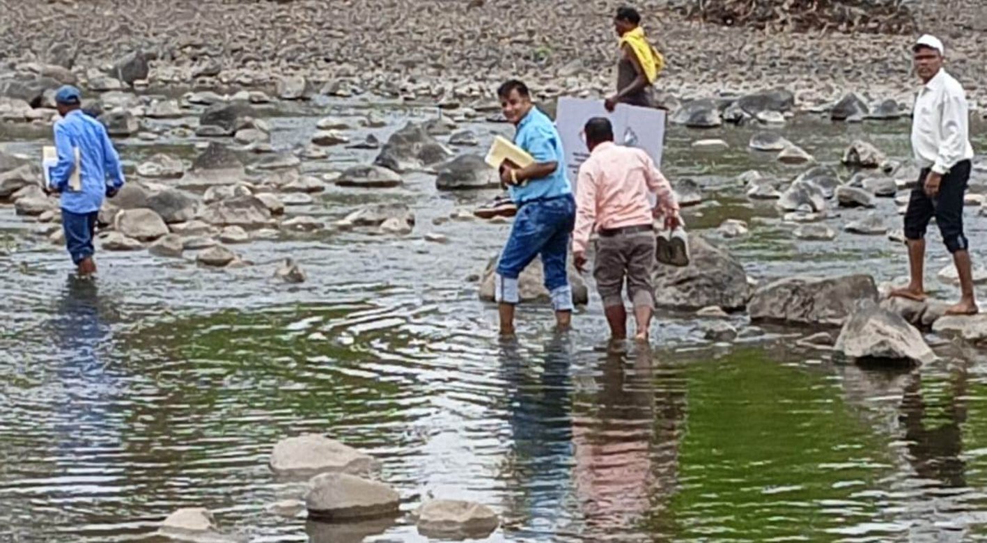 Struggle to vote: The team crossed the river to cast the vote of 87 year old Punia Bai