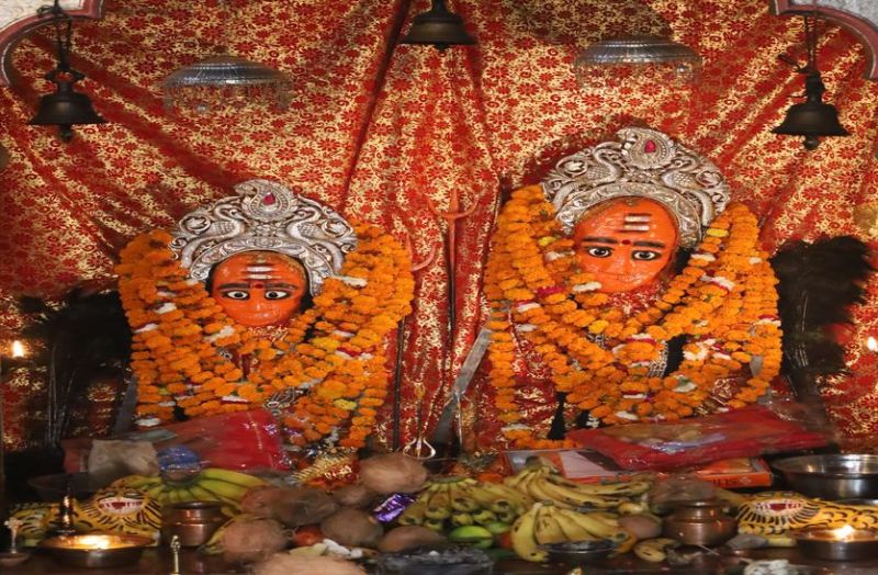 Loud mother emerges from the ground, filling the bags of devotees