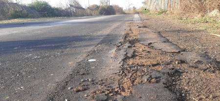 Quality not taken care of in road construction, gravel and asphalt are coming out just by hand
