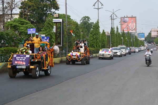Raipur@patrika. Women on open jeep with election festival Desh Ka Pride poster in sweep car rally.