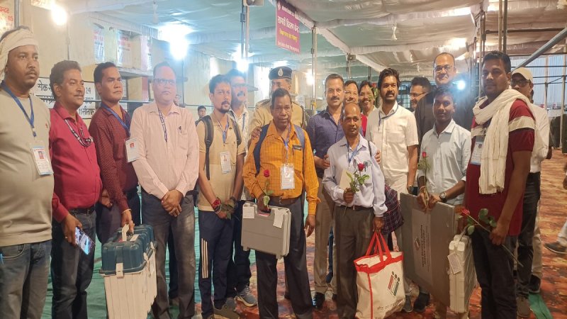 Collector gave rose flower to Polling party