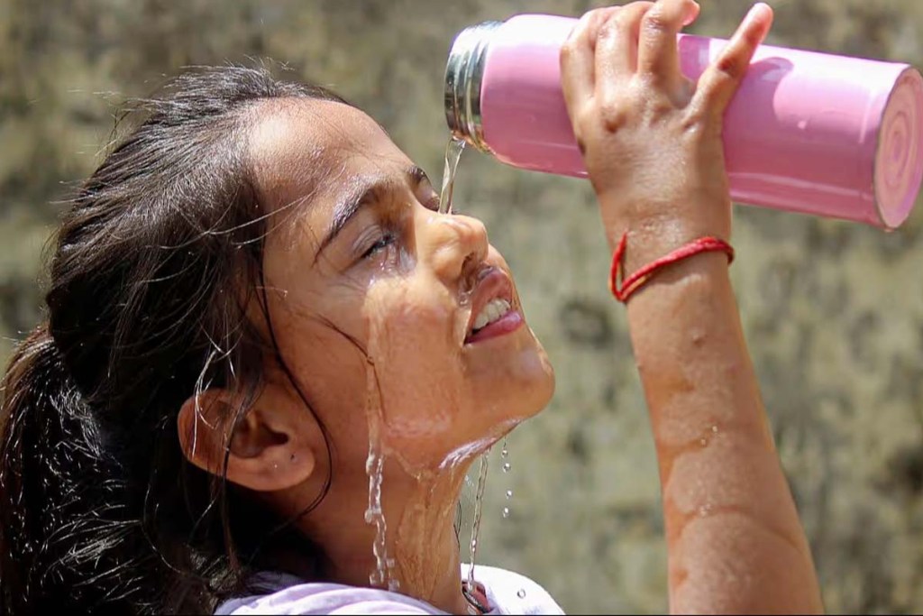 Chhattisgarh Rains: Girl drenching herself in hot climate