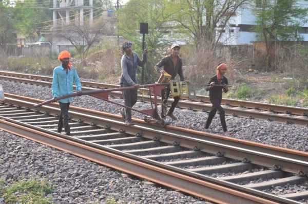 Railway Gang: Old track changed at railway crossing to increase speed of trains