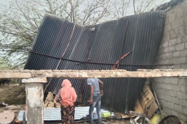 roofing sheets blown by strong wind