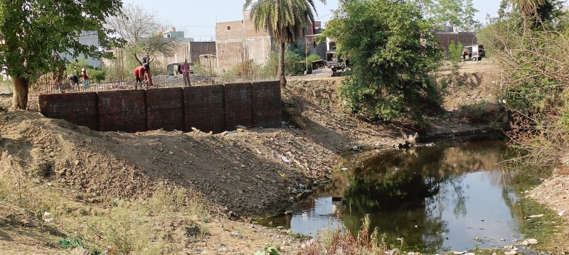 Wall of house being built in Motichur river, beginning of eradicating the river.