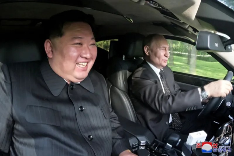 Vladimir Putin takes Kim Jong Un on drive