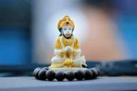 How to stick God idol in car dashboard