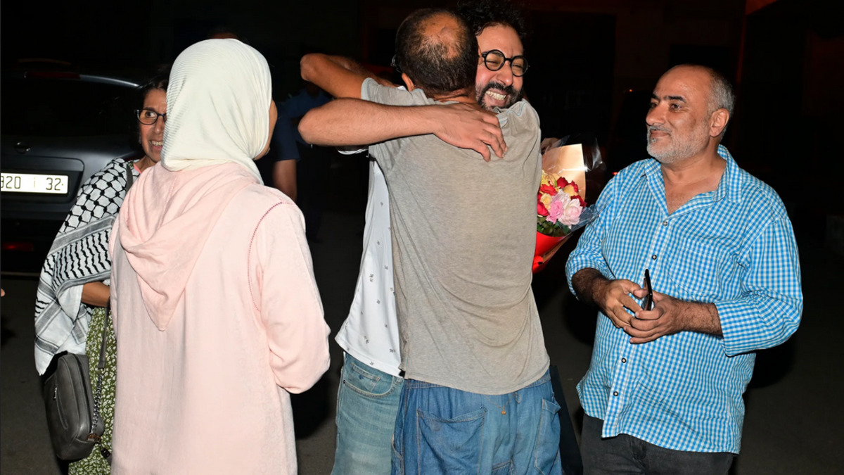 Released prisoners with their family in Morocco