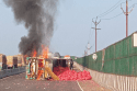 Onion truck overturns and catches fire, two burn alive