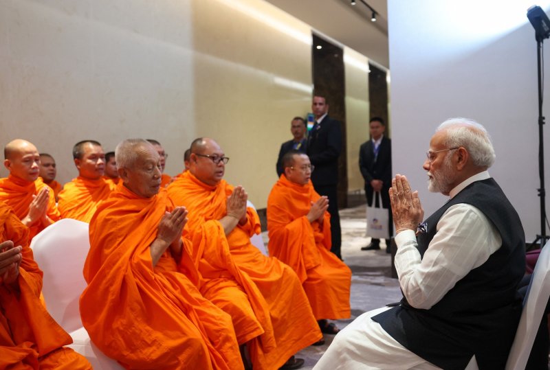 PM Narendra Modi meets monks and spiritual leaders in Laos