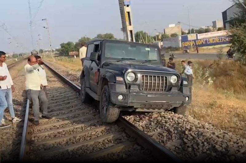 SUV on railway track