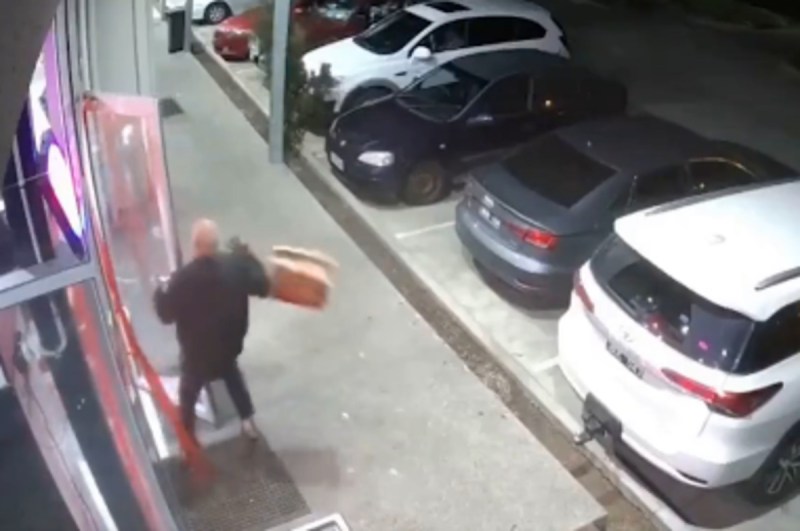 Wind drops a man's pizza